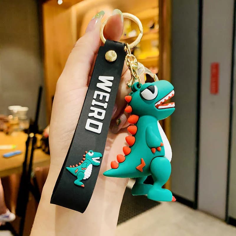 Cute Dinosaur Keychain with "WEIRD" Strap – Fun & Quirky Accessory