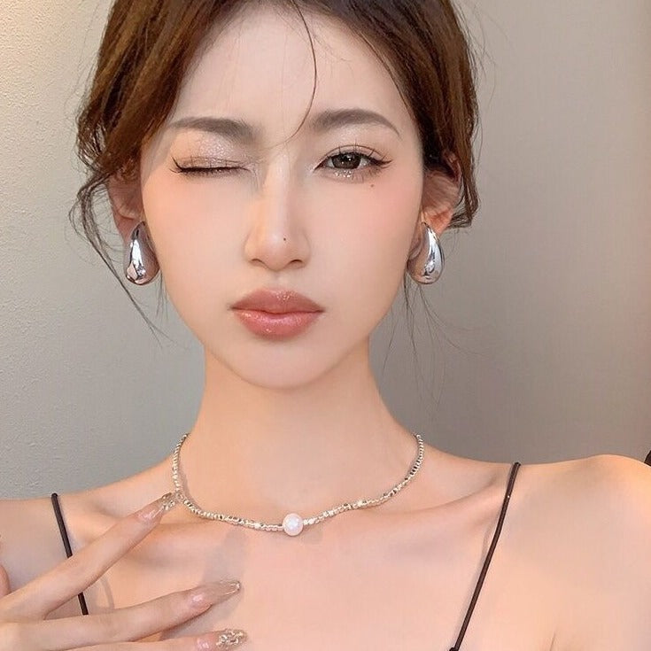 Hollow Water Drop Earrings – Polished Silver Statement Jewellery