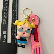 Cute Cartoon Girl Keychain with Pink Wrist Strap – Fun Bag Charm Accessory