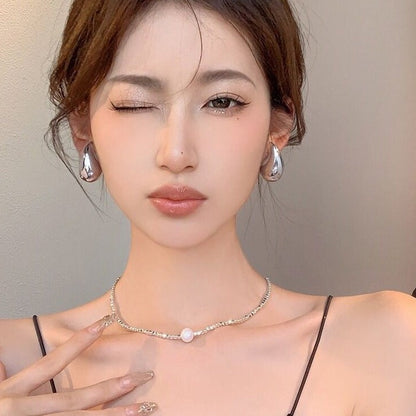 Hollow Water Drop Earrings – Polished Silver Statement Jewellery