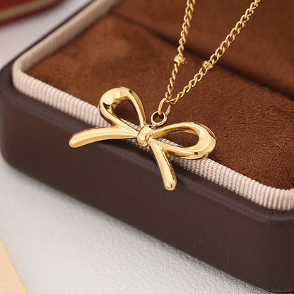 Elegant Gold Bow Pendant Necklace – Feminine and Chic Jewelry for Women
