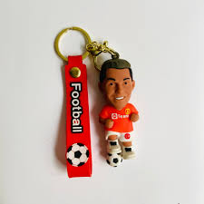 Football Player Cartoon Keychain with Red Strap – Sports Fan Accessory