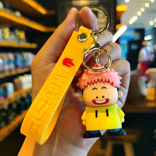 Cute Cartoon Boy Keychain with Yellow Hoodie & Wrist Strap